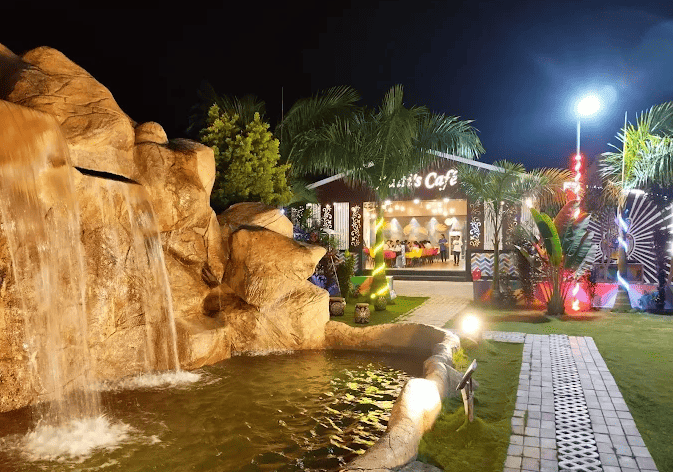 Waterfall and Aditi's Cafe at night